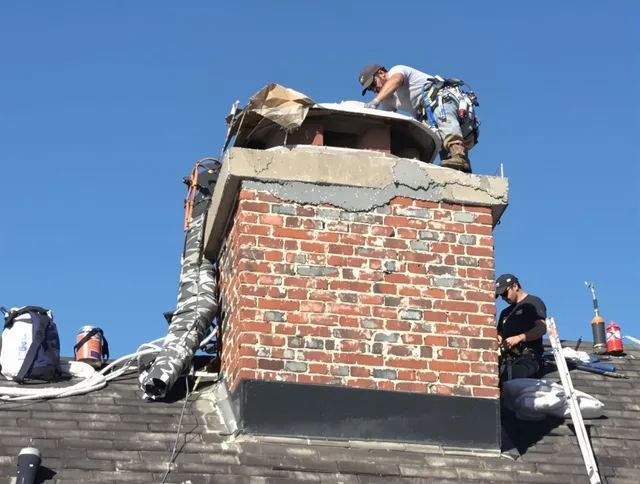 Rancho Santa Margarita Chimney Sweep installing a custom chimney crown in Rancho Santa Margarita, CA
