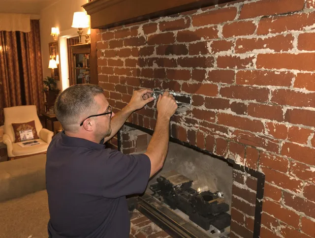 Rancho Santa Margarita Chimney Sweep expert fixing a fireplace in Rancho Santa Margarita, CA